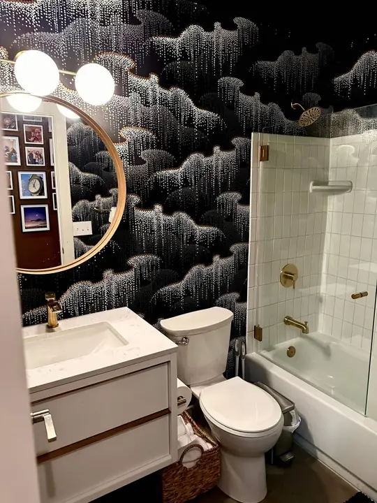 Bathroom with patterned wallpaper