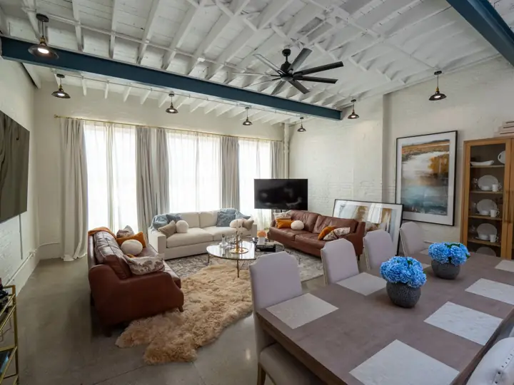 Penthouse living room with leather sofas