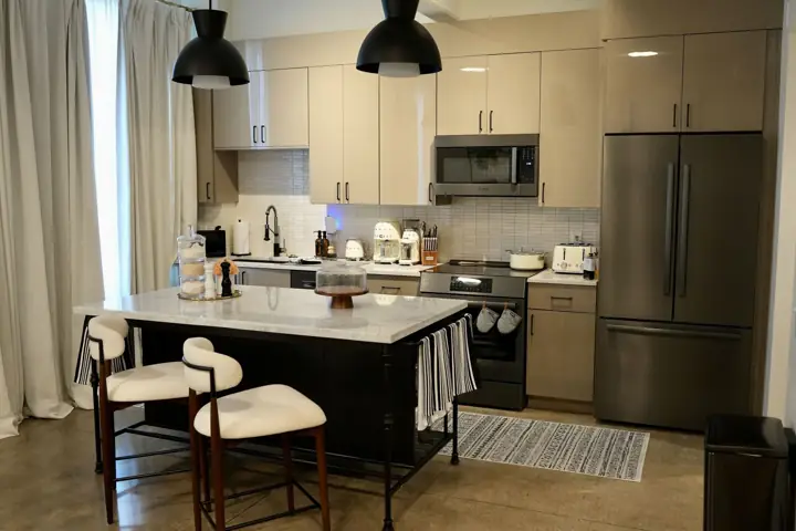 Kitchen with island and pendant lights