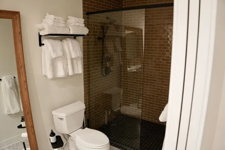 Tile shower and towels